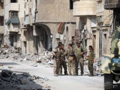 Силы Коалиции в освобожденной Ракке. Фото: Reuters, источник - lemonde.fr